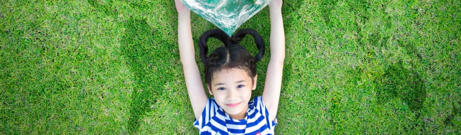 Image of a girl on the grass